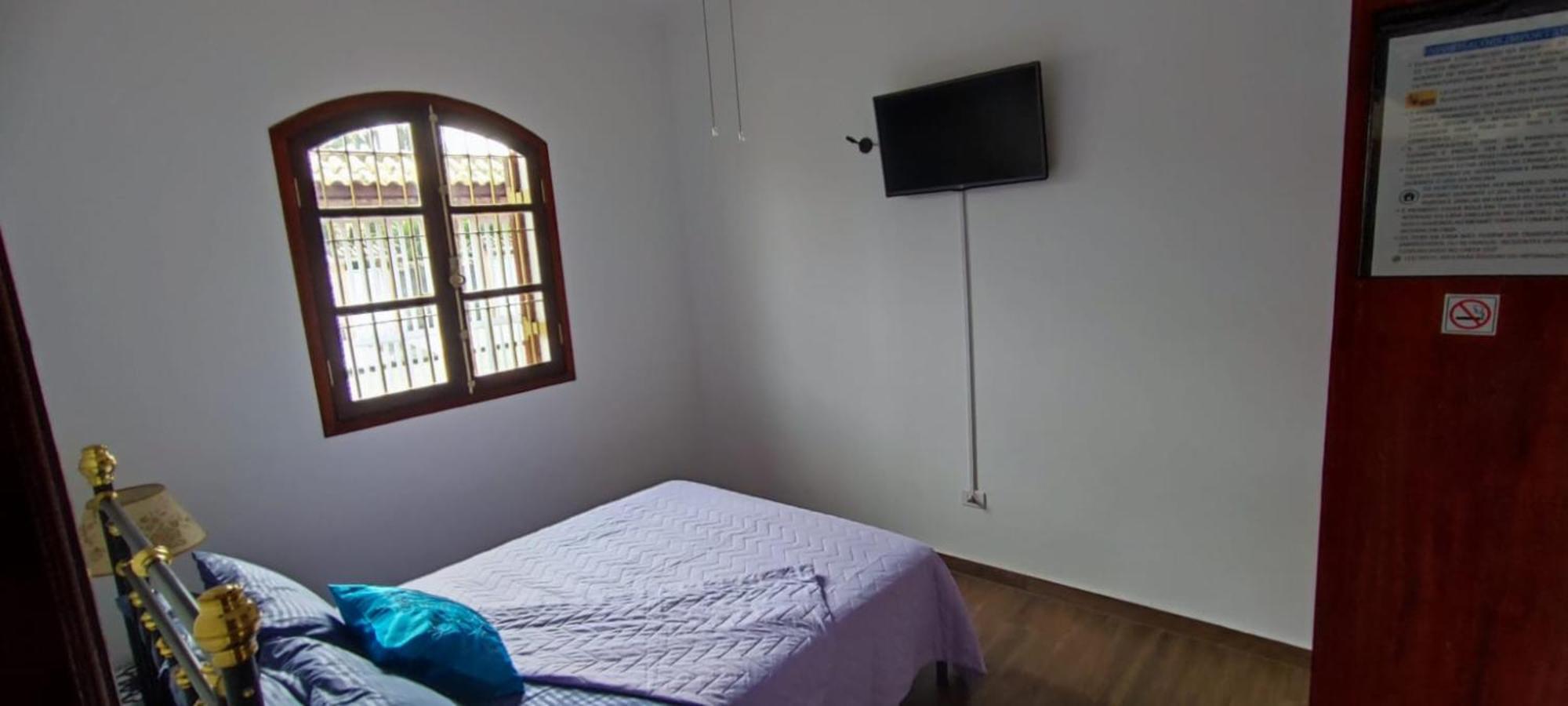 Casa Rosa de Peruíbe - Casa de Temporada 3 dormitórios, 10 hóspedes, piscina, wi-fi, netflix, 800 metros da praia Exterior foto